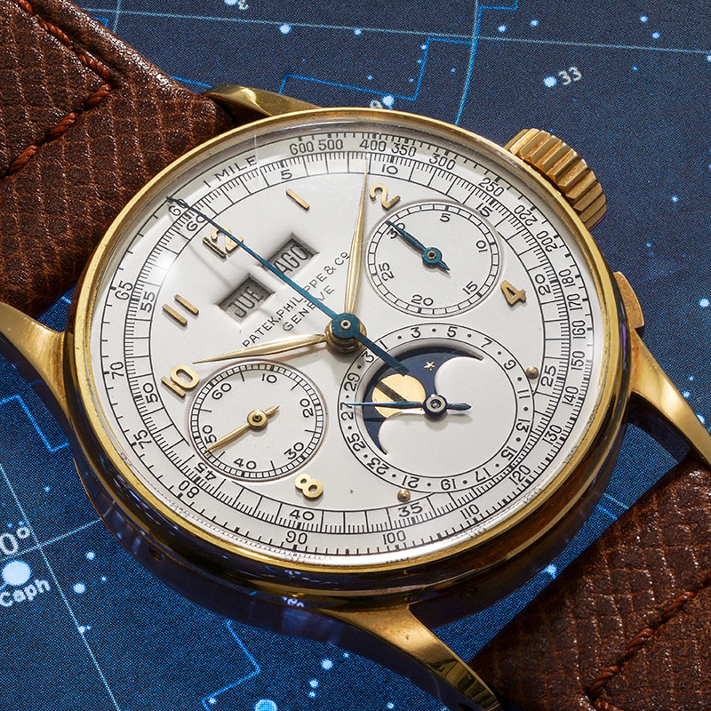 Хронограф Patek Philippe Ref. 1518 в 35 мм корпусе из розового золота с вечным лунным календарями